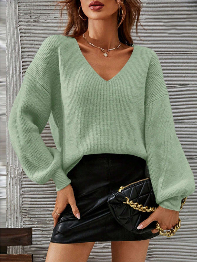 Damer V-hals sweater med en afslappet pasform og fashionable ballon ærmer Stilla