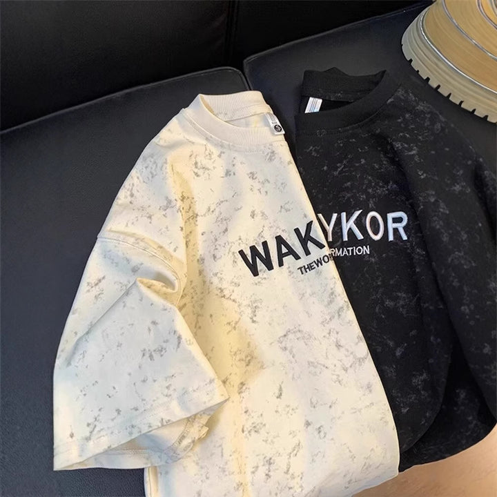 Dame Oversized T-shirt med kreativ tekst og unikt design Stilla