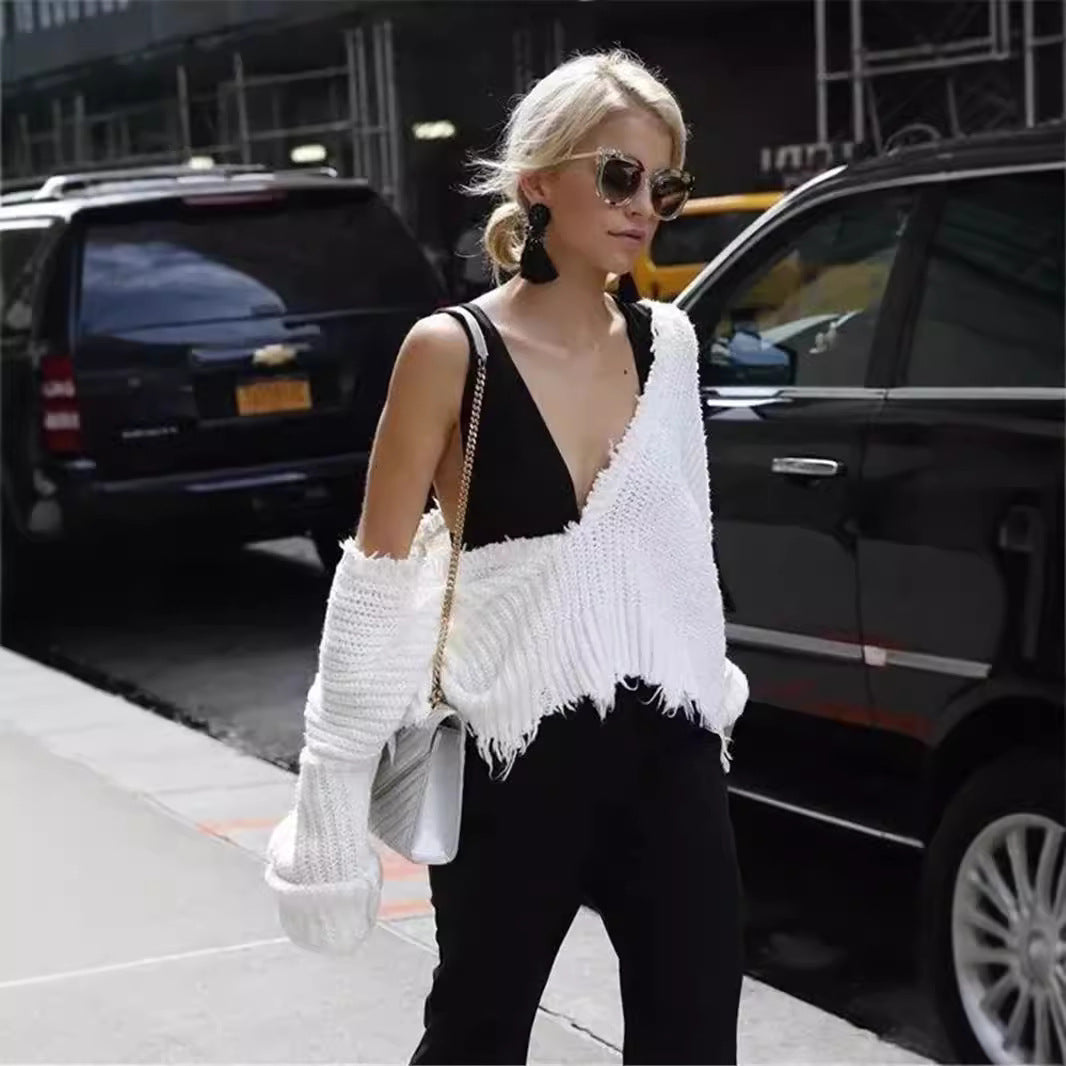 Dame trendy pullover med asymmetrisk snit og afslappede frynser Stilla