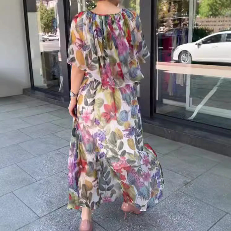 Dame Maxikjole med transparent blomsterdesign og elastisk talje Stilla