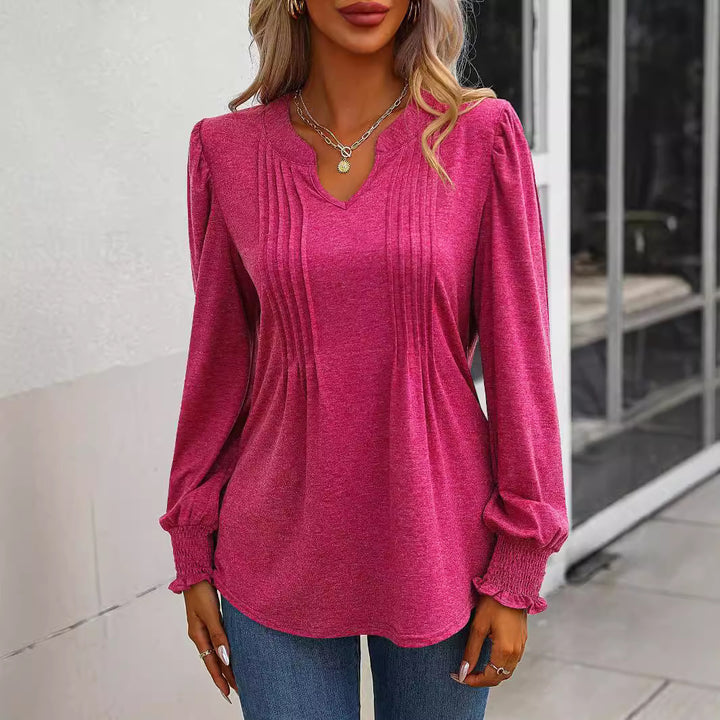 Damebluse med raffinerede folder Stilla