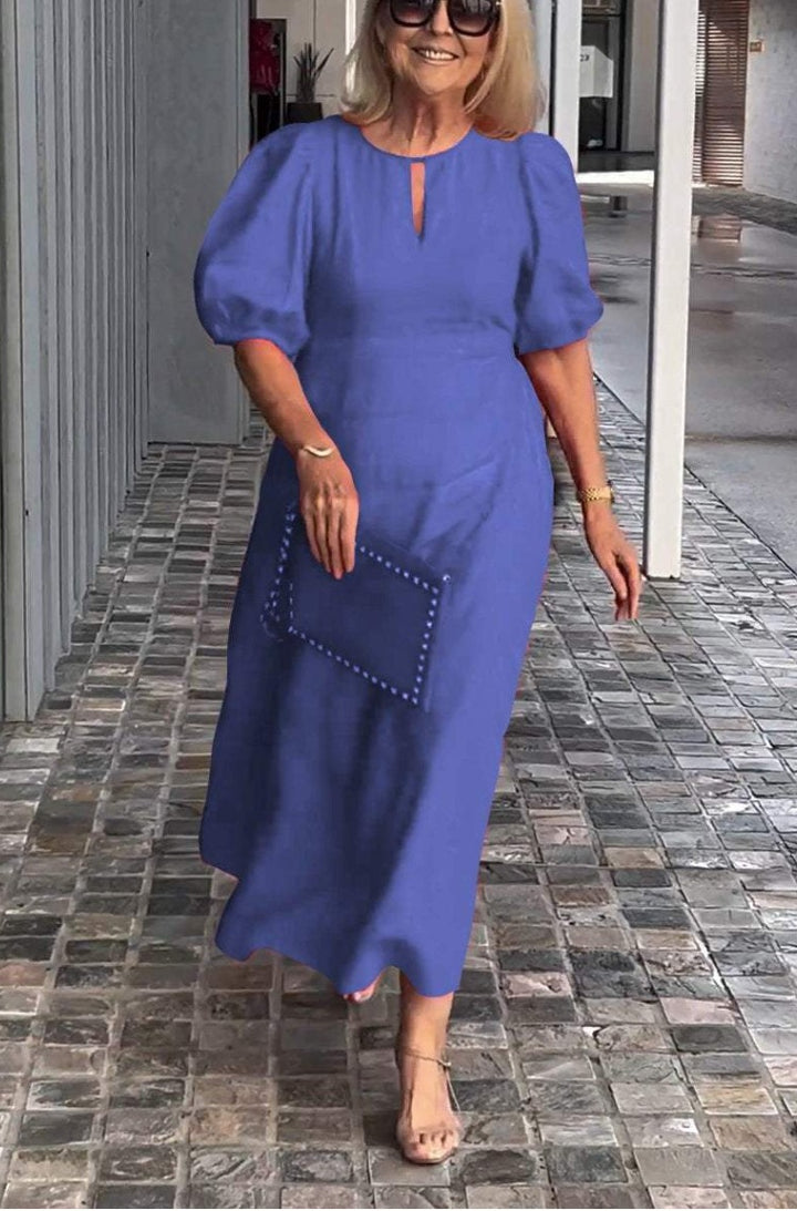 Dame elegant, løs maxikjole med puffærmer og smart udskæring Stiila