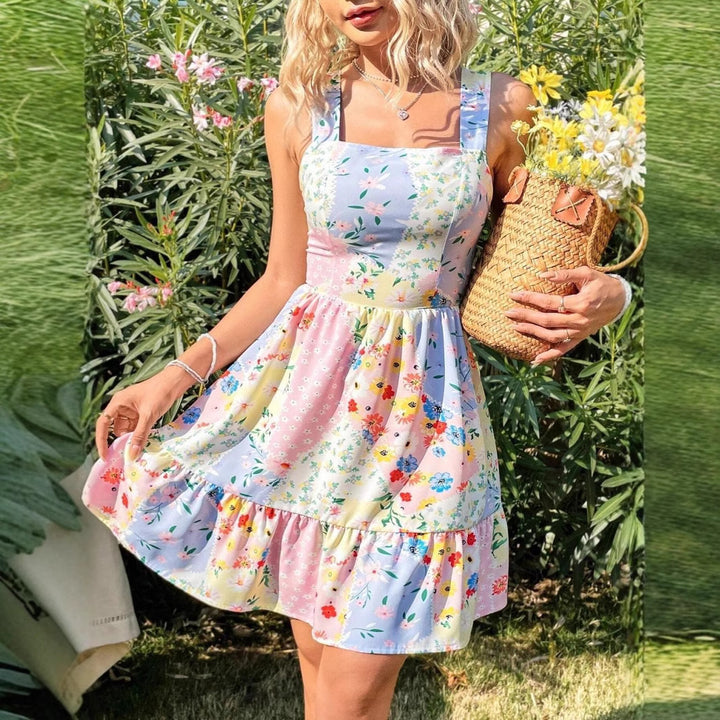 Dame sommerligt fritidskjole med blomsterpatchwork-design Stilla