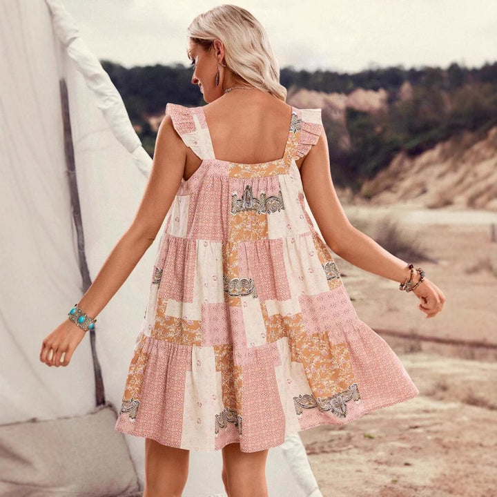 Dame fritidskjole med legende ruffle detaljer og patchwork mønster Stilla