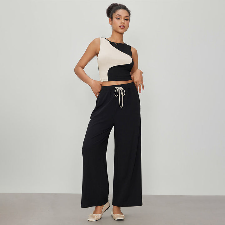 Kvindernes kortskåret top med asymmetrisk design og fashionable kontraster Stilla