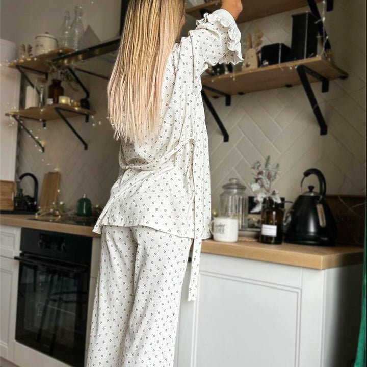 Dame afslappet pyjamas sæt med voluminøse flæse detaljer Stilla