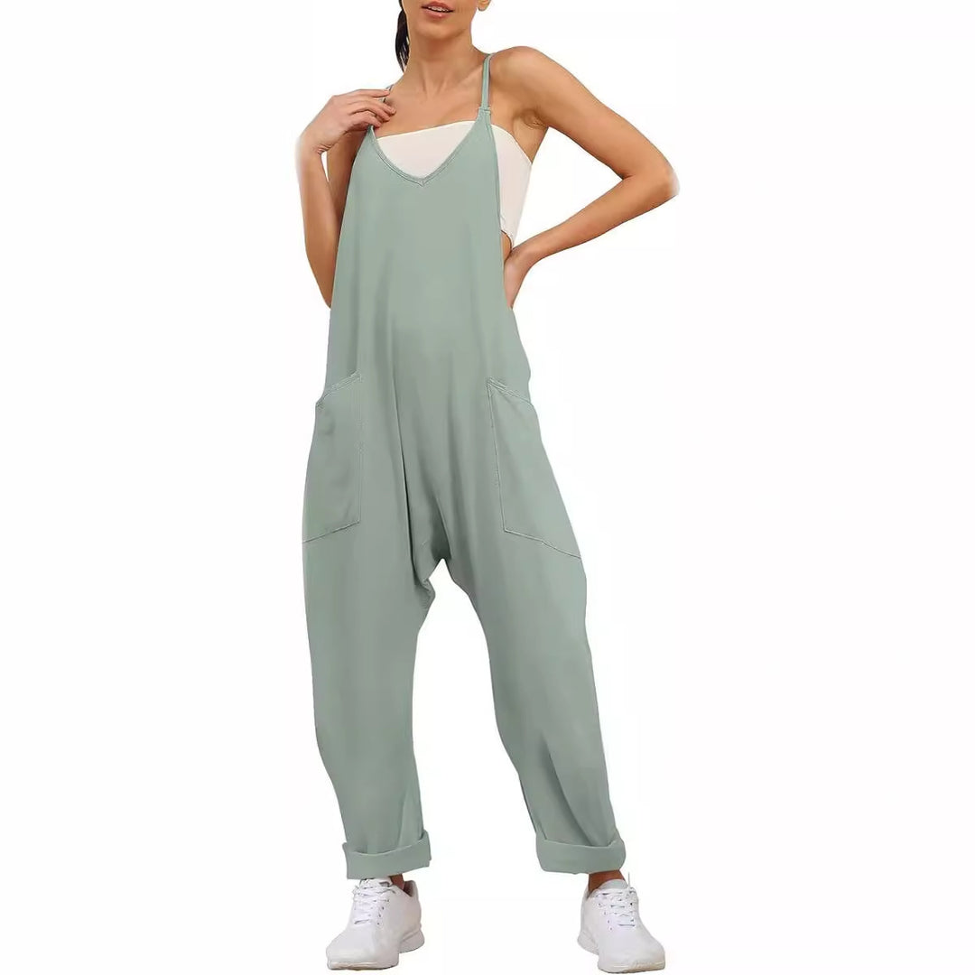 Dame Afslappet Jumpsuit med dyb udskæring og praktiske lommer Stilla