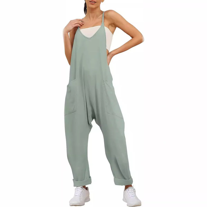 Dame Afslappet Jumpsuit med dyb udskæring og praktiske lommer Stilla
