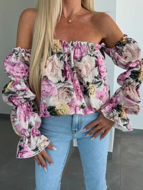Damebluse med blomstret design og ballonformede ærmer Stilla