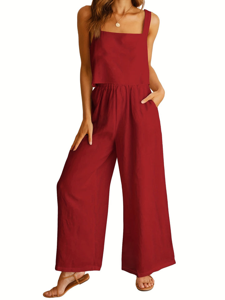 Dame bred jumpsuit med elegant snit og elastisk taljebånd Stilla