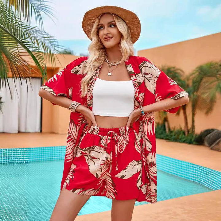 Dame sommerligt strandoutfit med floraltryk og løs pasform Stilla