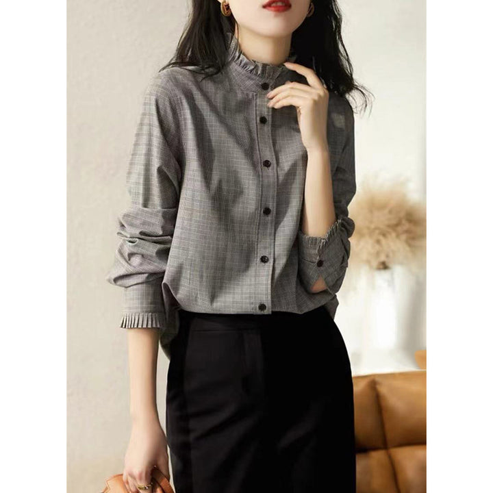 Damebluse med ståkrave og struktureret design Stilla
