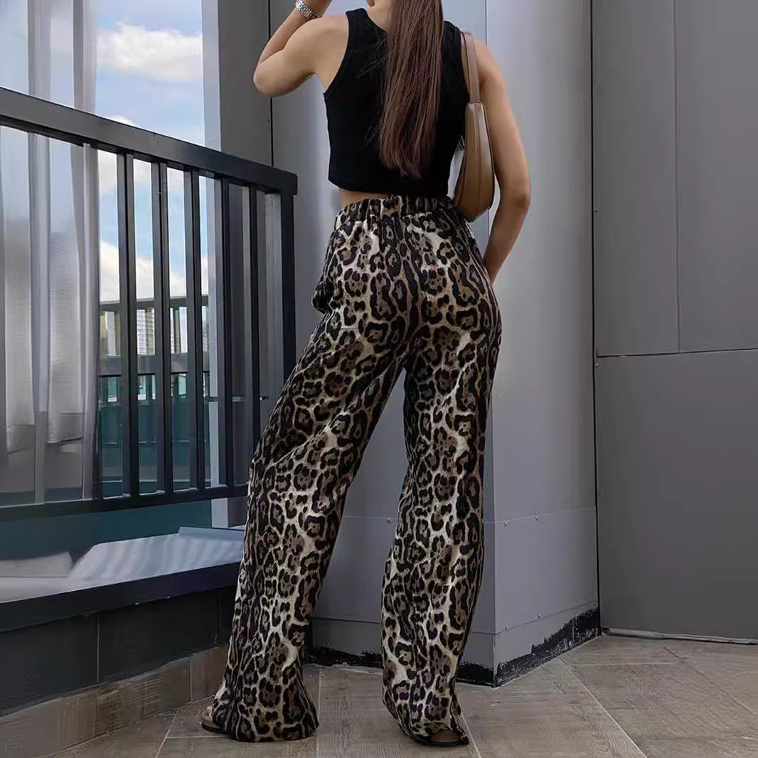 Dame afslappet Palazzo-bukser med moderigtigt leopardmønster og elastisk talje Stiila