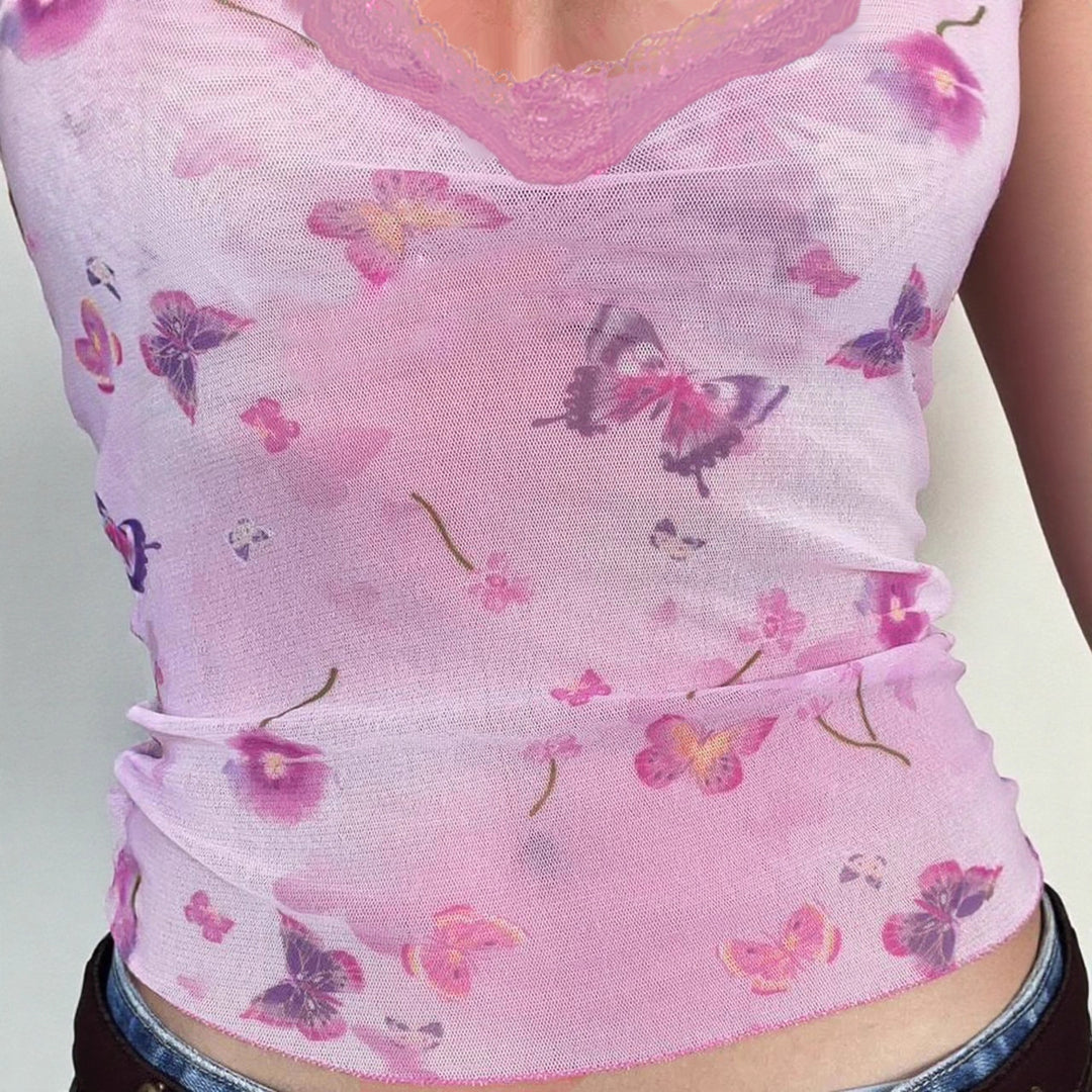 Dame blondertop med blomstret design Skovae
