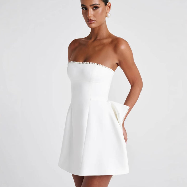 Dame minikjole med elegant bustier-overdel og trendy ruffle-detaljer Stilla