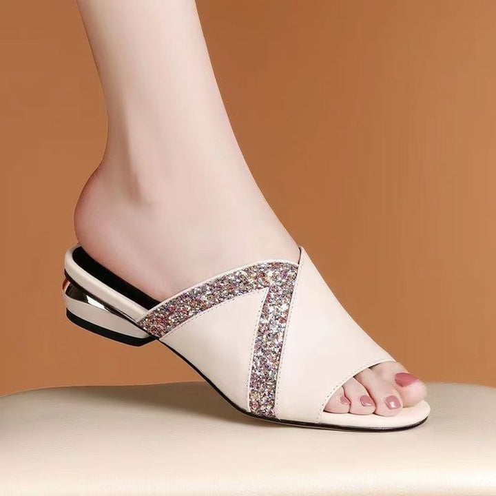 Dame elegante mules med funklerende detalje og svunget design Stilla