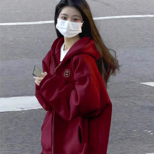 Dame Oversized Zip-Up Hoodie med kængurulommer og stilfuld brodering Stilla