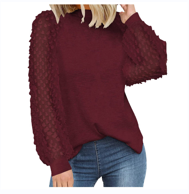 Dame strikpullover med transparente pufærmer Stilla