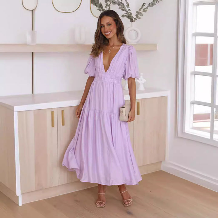 Dame Maxikjole med dyb V-udskæring og elegante puffærmer Stilla