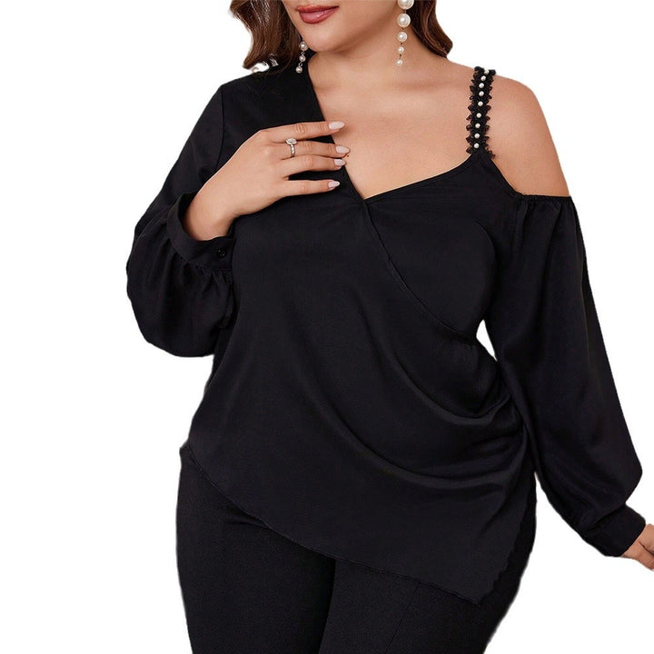Dame asymmetrisk bluse med legende cut-out og dekorative stropdetaljer Stilla
