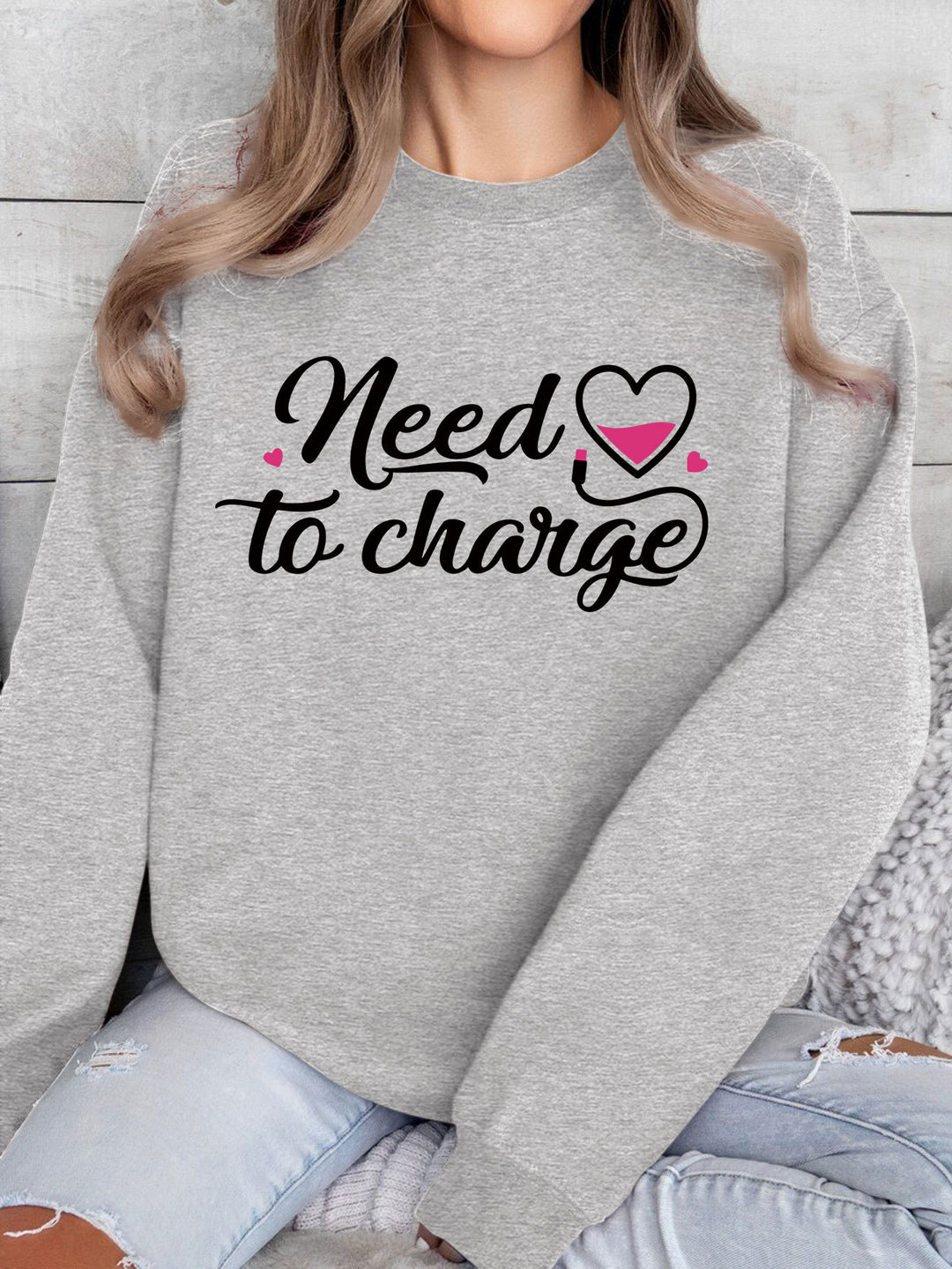 Kvindernes sweatshirt med inspirerende hjerte citat og afslappet skæring Stilla