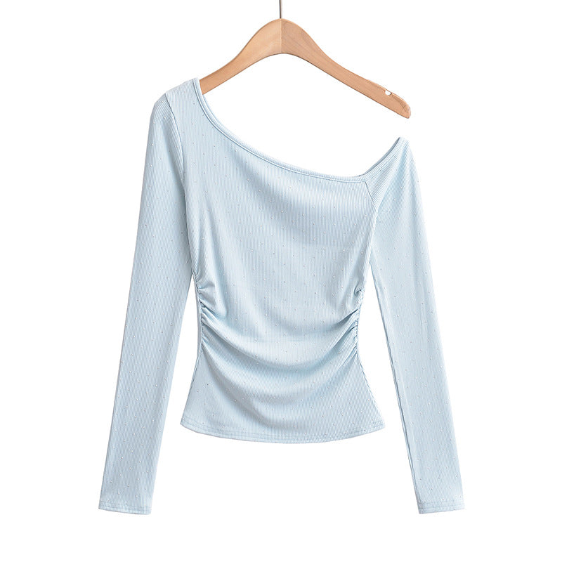 Dame asymmetrisk longsleeve-top med elegant ruffle-design og figurformende snit Stilla