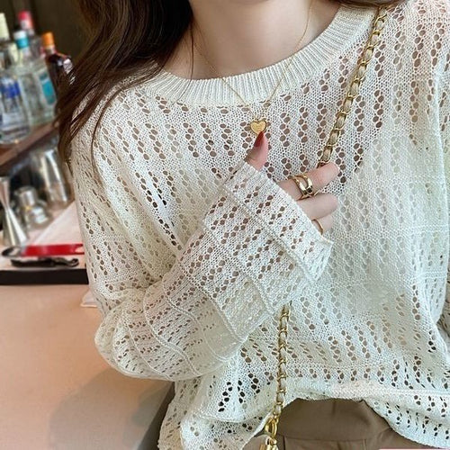 Dame finstrikket sweater med luftig huldesign og løs pasform Stilla