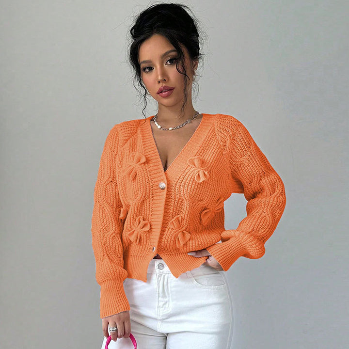 Kvinders cardigan med blomster-reliefdesign og knapbare detaljer Stilla