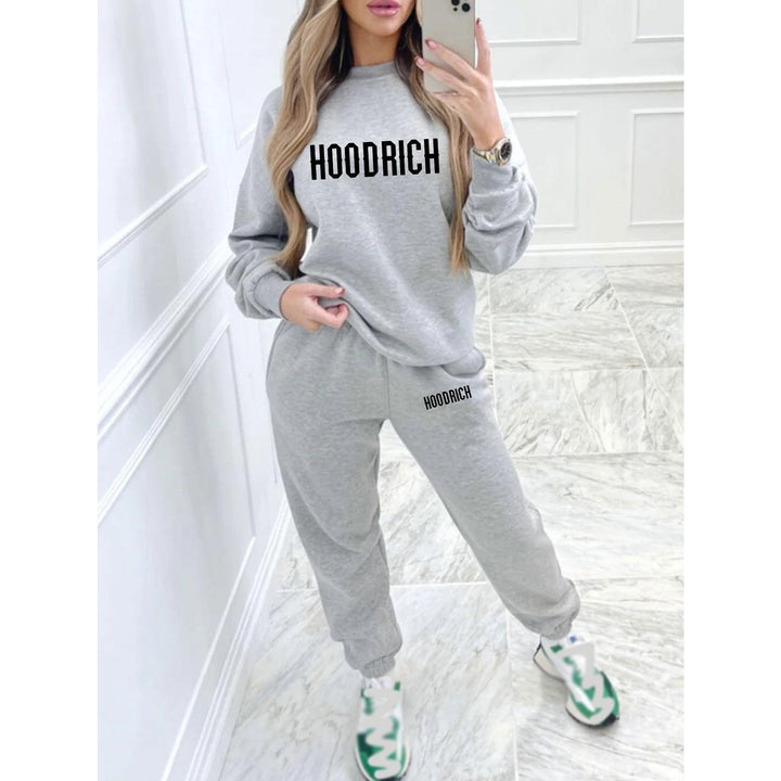 Kvinders casual sæt af sweater og joggers med sporty tryk Skovae