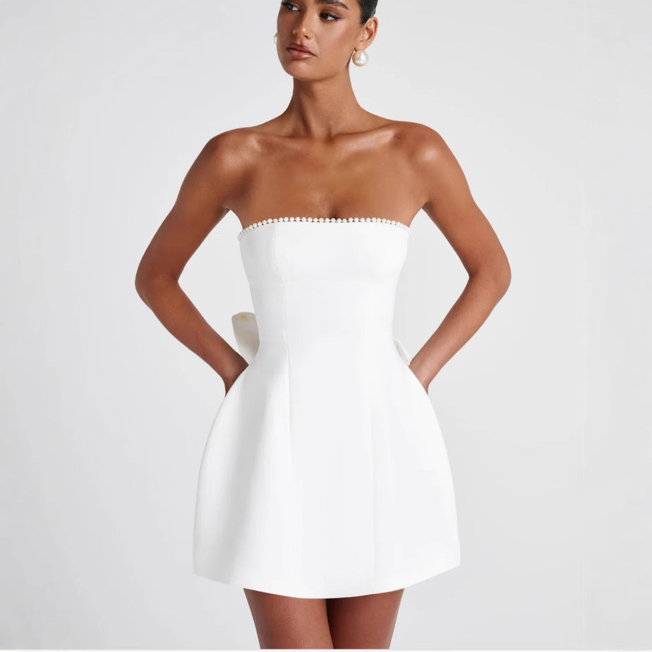 Dame minikjole med elegant bustier-overdel og trendy ruffle-detaljer Stilla
