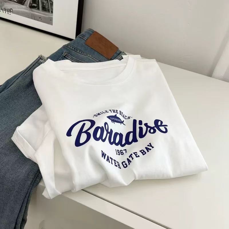Dame T-shirt med begrundet Paradise-tryk og løs pasform Stilla