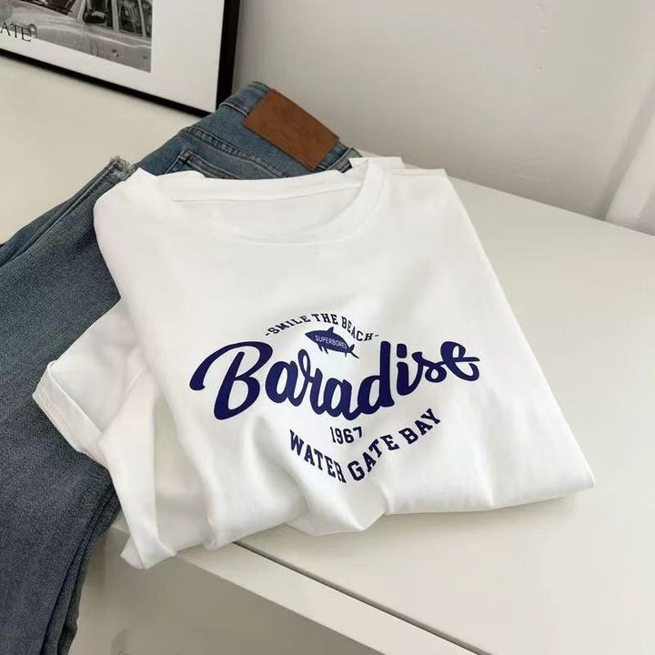 Dame T-shirt med begrundet Paradise-tryk og løs pasform Stilla