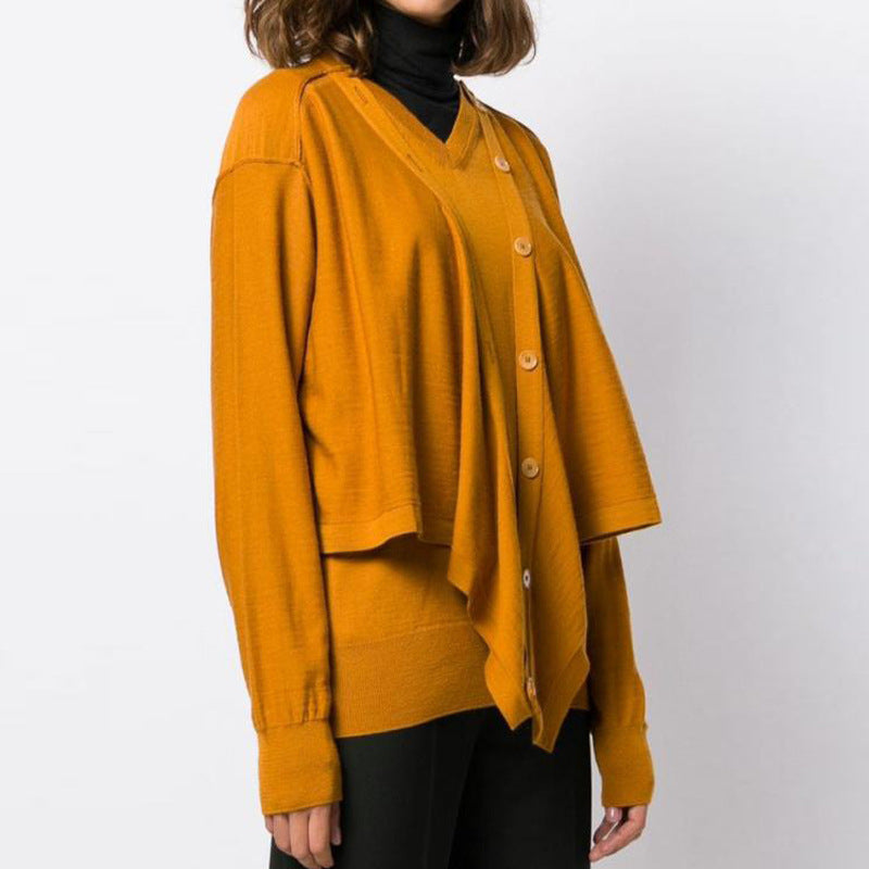 Kvinders afslappede strikket cardigan med asymmetrisk snit og knapdetaljer Stilla