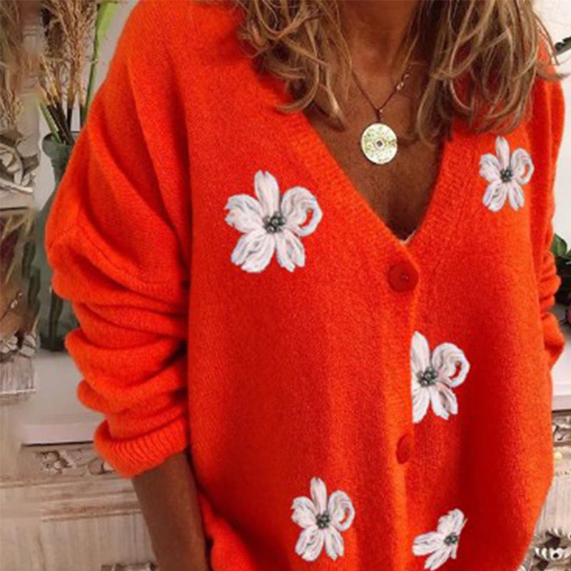 Dame strikjakke med florale applikationer og knaplukning Stilla