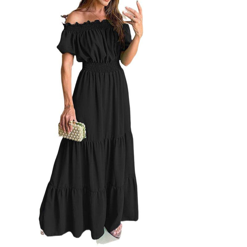 Dame maxikjole med off-shoulder design og voluminøse flæsedetaljer Skovae