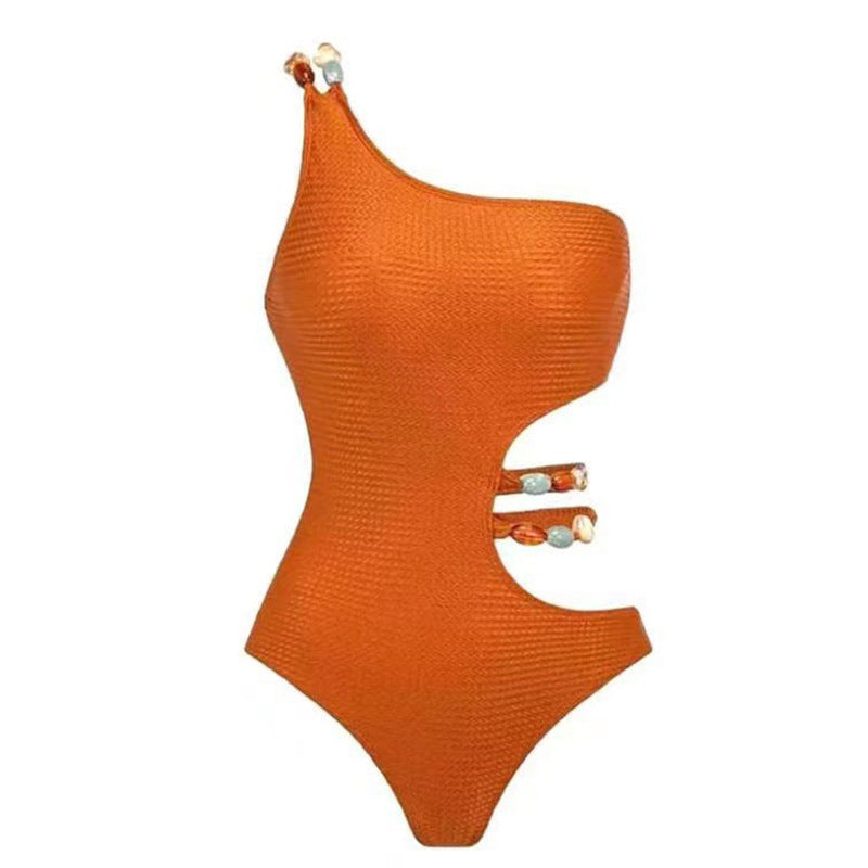Dame one-piece badedragt med smart cut-out og elegant overkjole Stilla