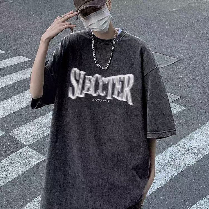 Dame oversized T-shirt med trendy urban grafisk design Stilla