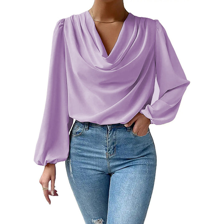 Damebluse med elegant vandfaldsudskæring og puffærmer Stilla