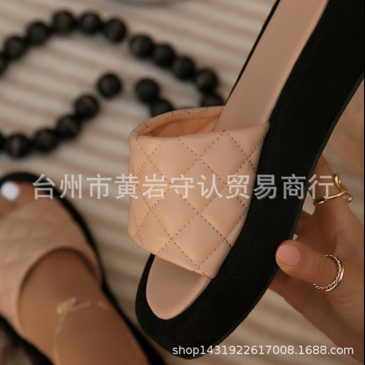 Dame mode slippers med quiltet overdel og høj plateau Stilla