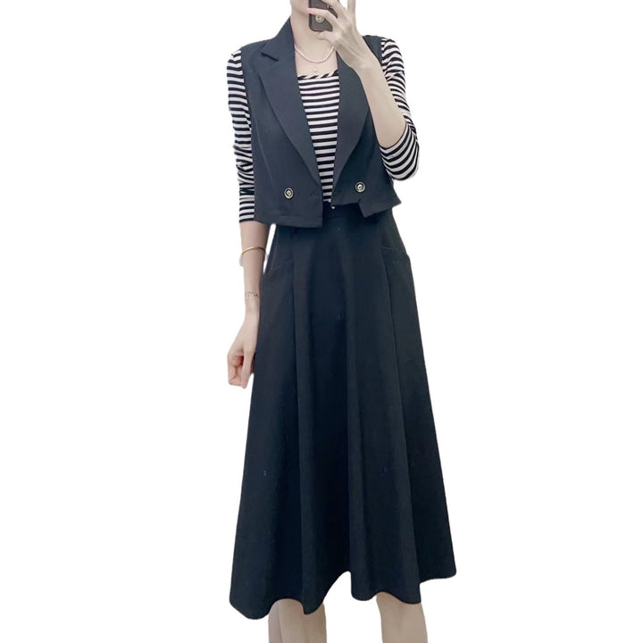 Dame Blazer-jumpsuit kombination med en smart, ubrudt nederdel og stilfulde detaljer Stilla