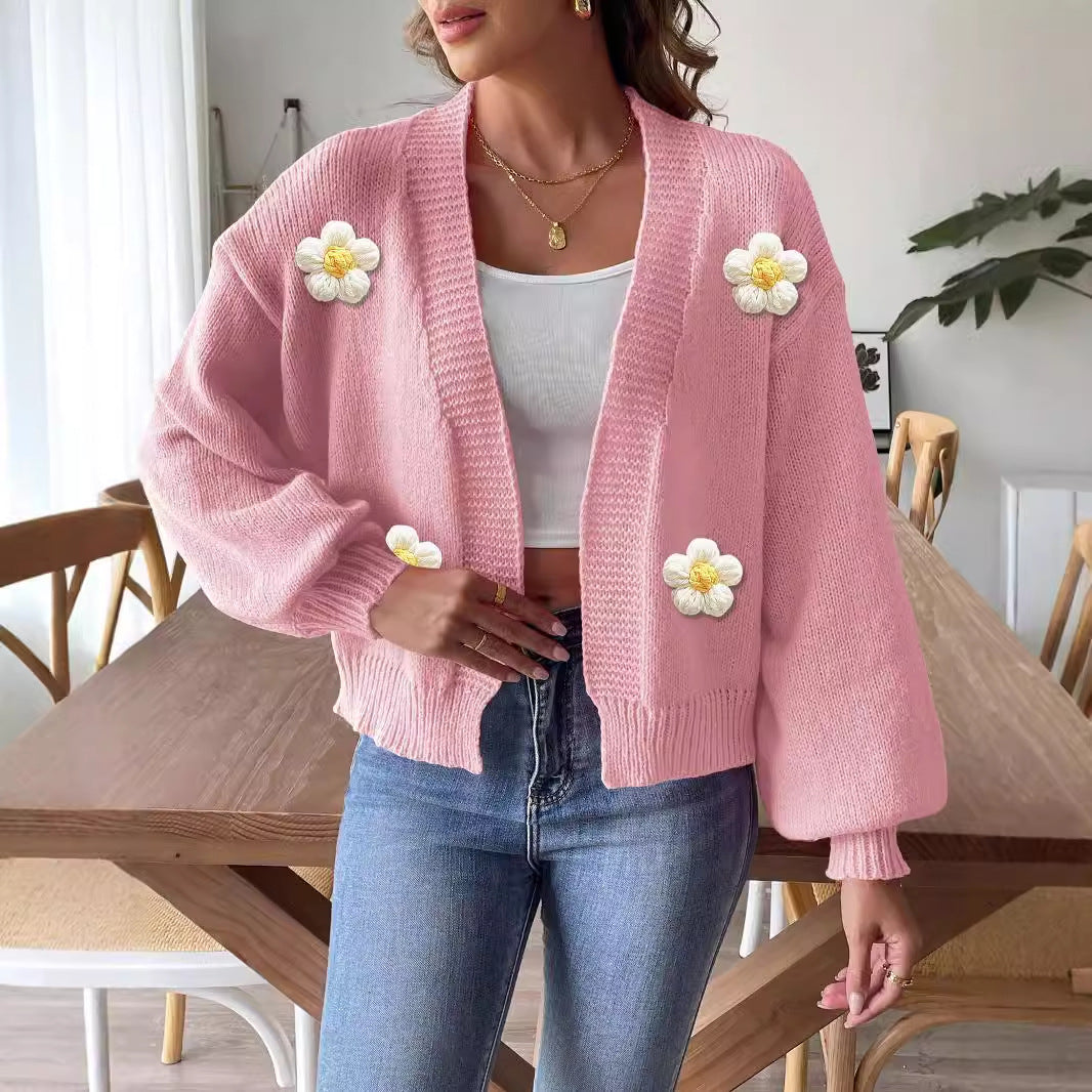 Dame grovstrikket jakke med blomsterdesign Stilla