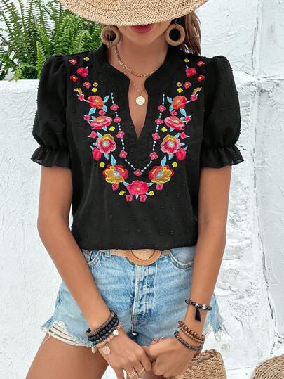 Damebluse med florale broderier og voluminøse ærmer Stilla