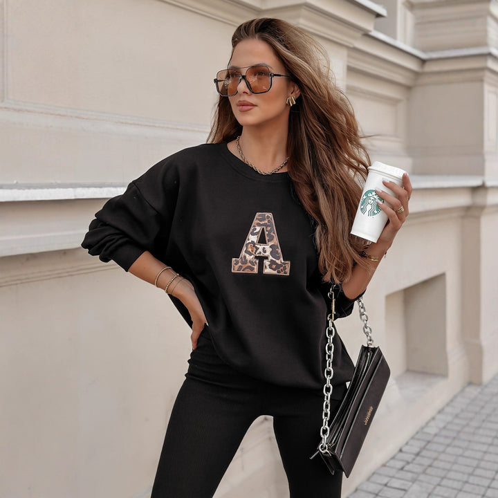 Dame afslappet sweatshirt med stort initial og afslappet pasform Stilla