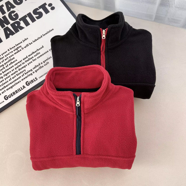 Kvinders fleece-pullover med høj krave og praktiske lynlåslommer Stilla