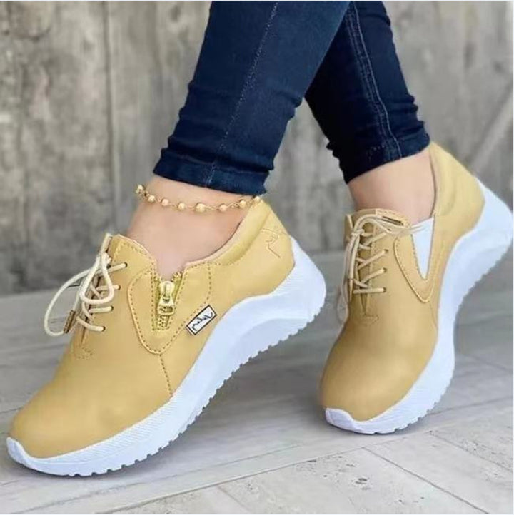 Dame Sporty Slip-On Sneakers med praktisk lynlåsåbning og behageligt fodseng Stilla