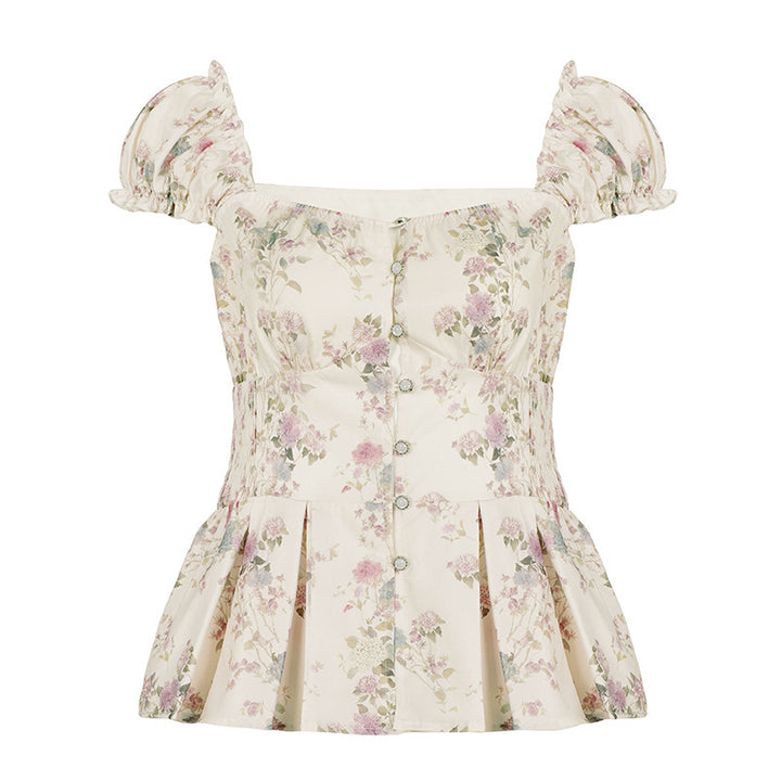 Damebluse med blomsterdesign og flæseærmer Skovae