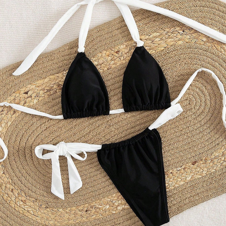 Dame triangel-bikini med justerbare stropper og feminint bindedetalje Skovae