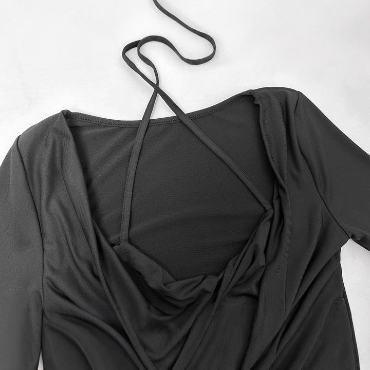 Dame figursyet top med rynker og off-shoulder design Skovae