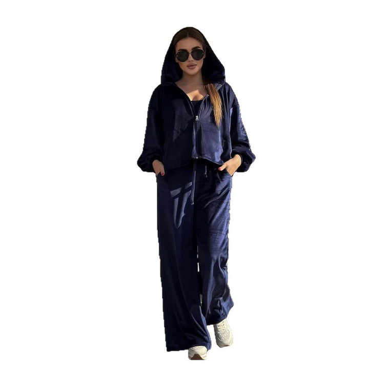 Kvinders sporty loungedragt i fløjllook med cropped top og brede bukser