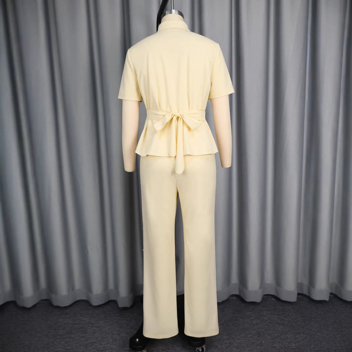 Damer Elegant Sæt bestående af tætsiddende top med cut-outs og smalt skårne bukser Skovae